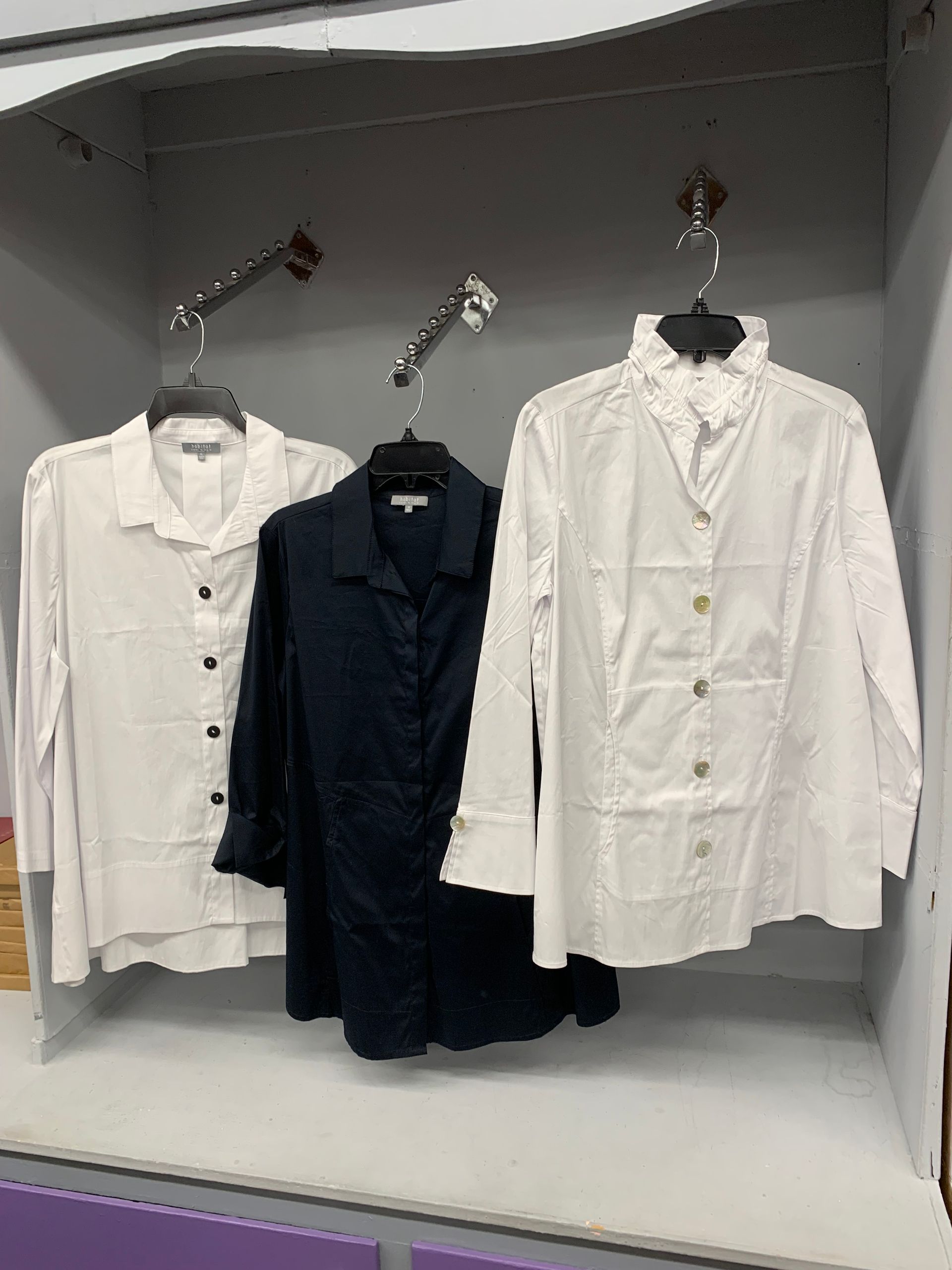 Blue denim crop top and skirt with a matching belt.