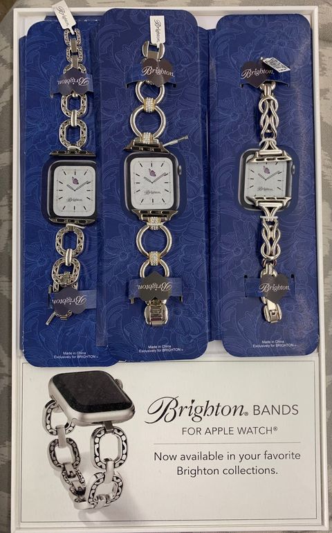 Brighton watch bands for Apple Watch in display. Silver chain links, square white faces, set in blue.