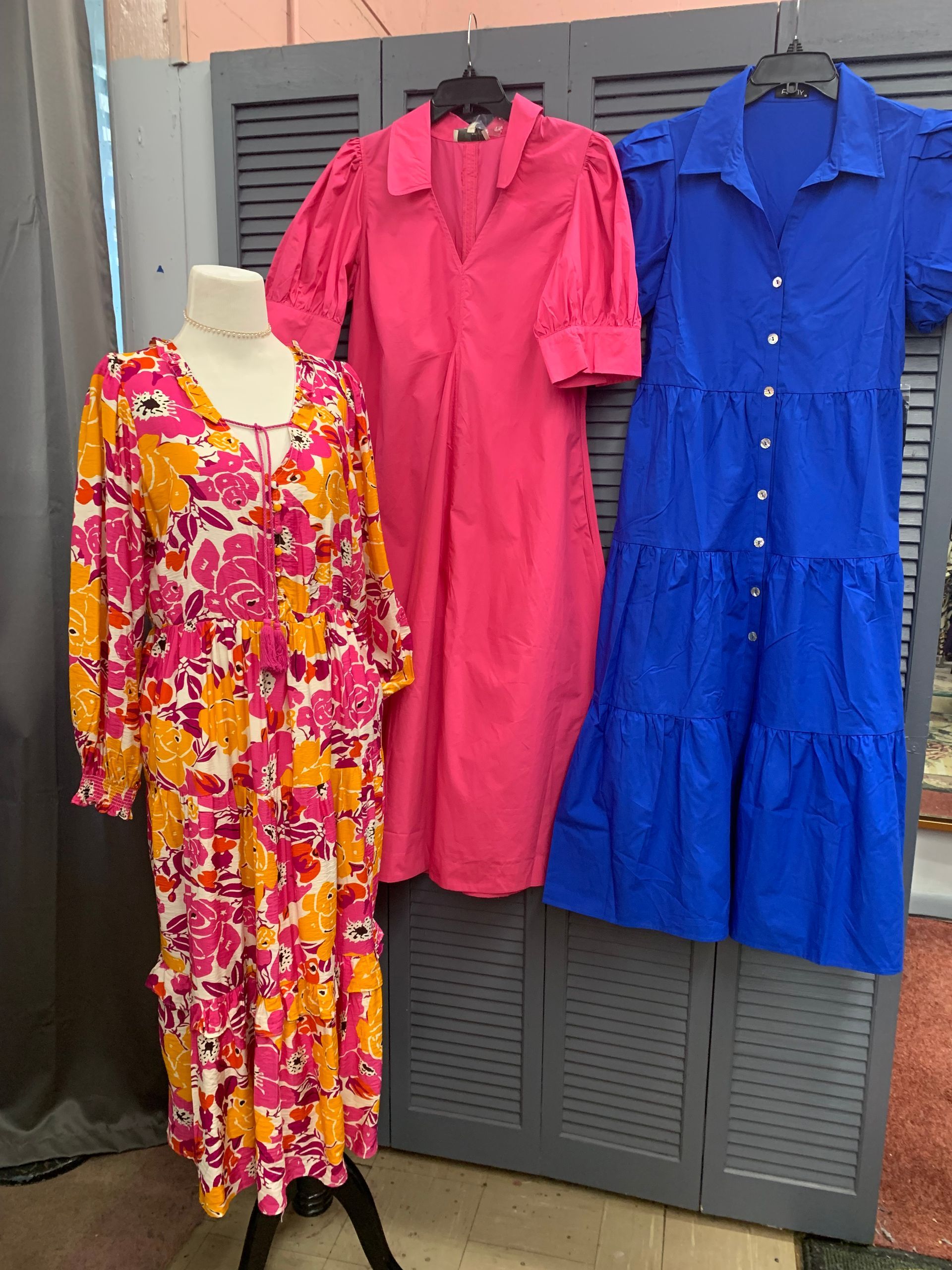 Green long-sleeved button-down blouse with sequined collar and two chest pockets.