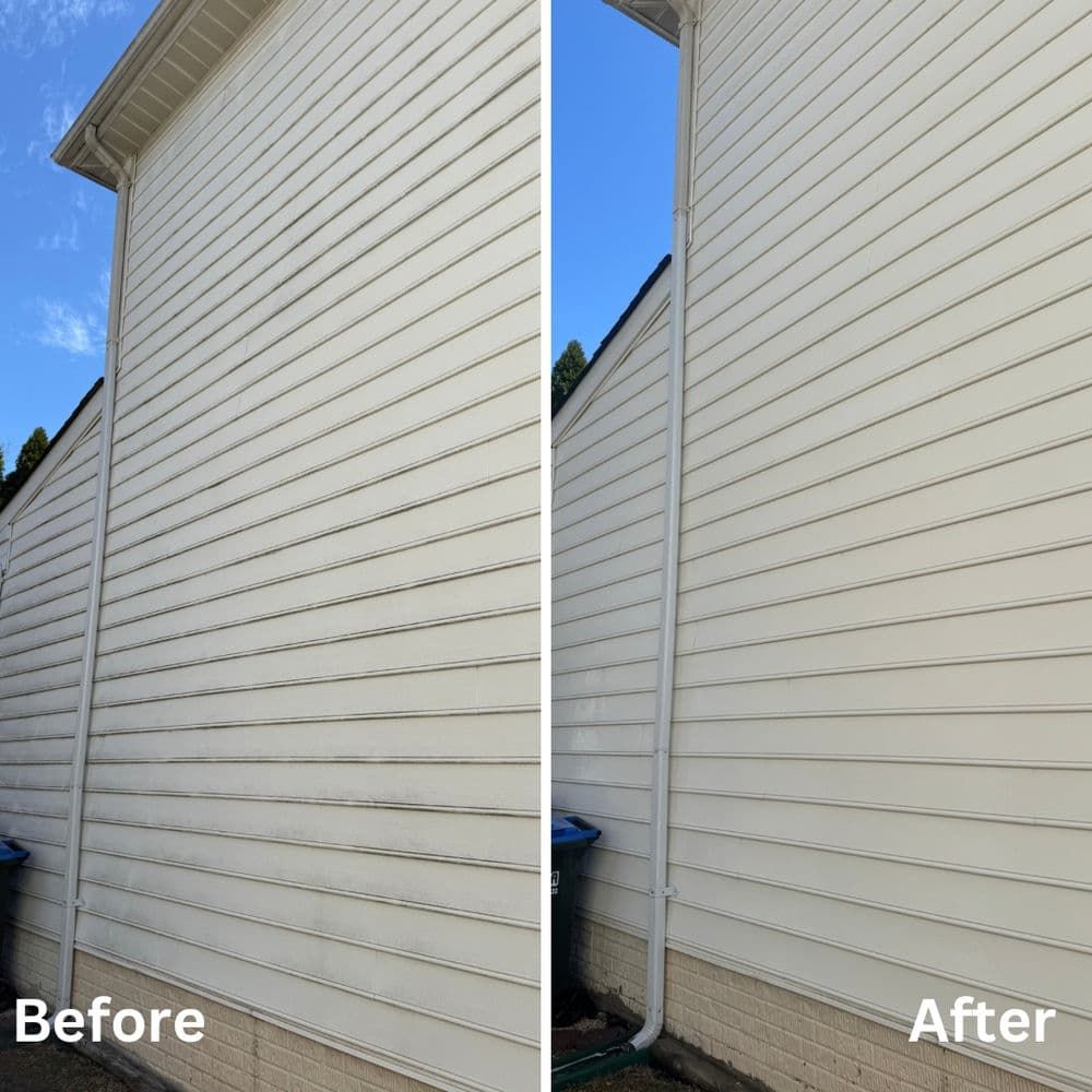 Side-by-side comparison: Before and after power washing shows clean siding on a house.