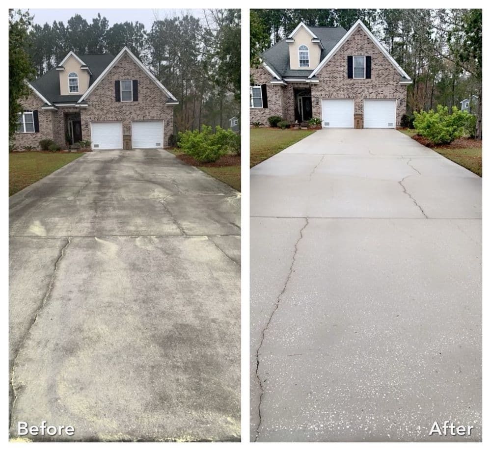 Driveway cleaning comparison: a two-story brick house with a dirty driveway 