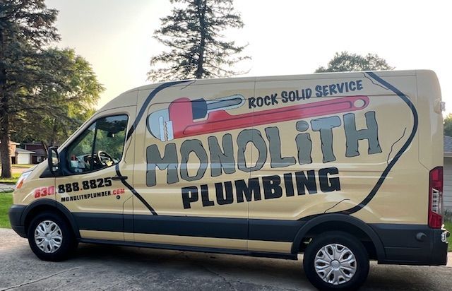 Orange and white striped traffic cones and barricade with 