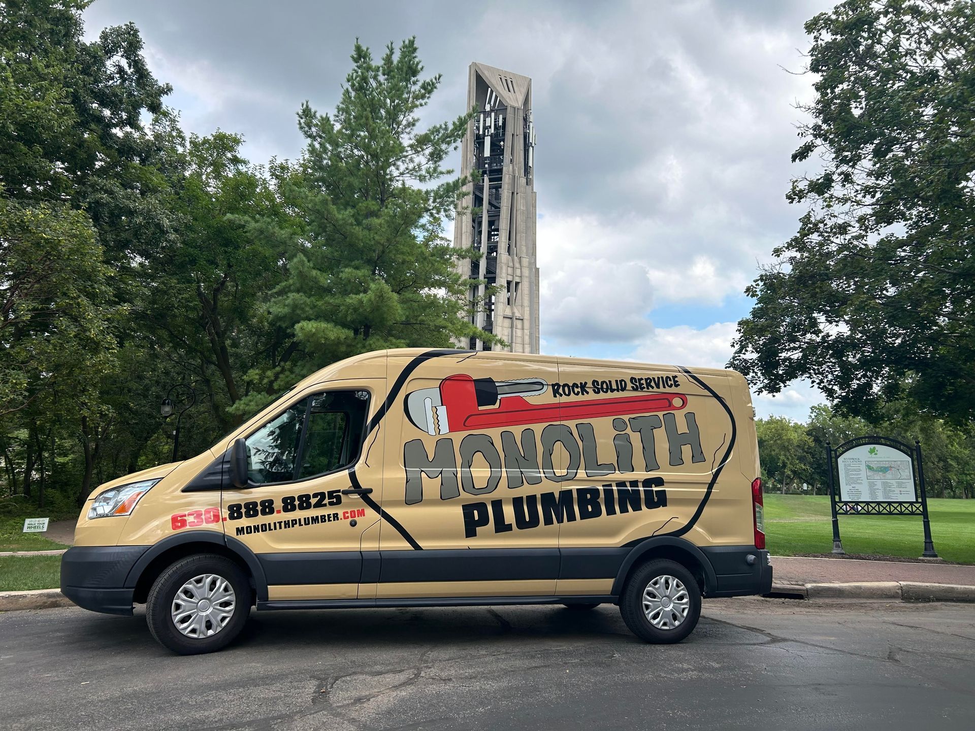 Orange and white striped traffic cones and barricade with 