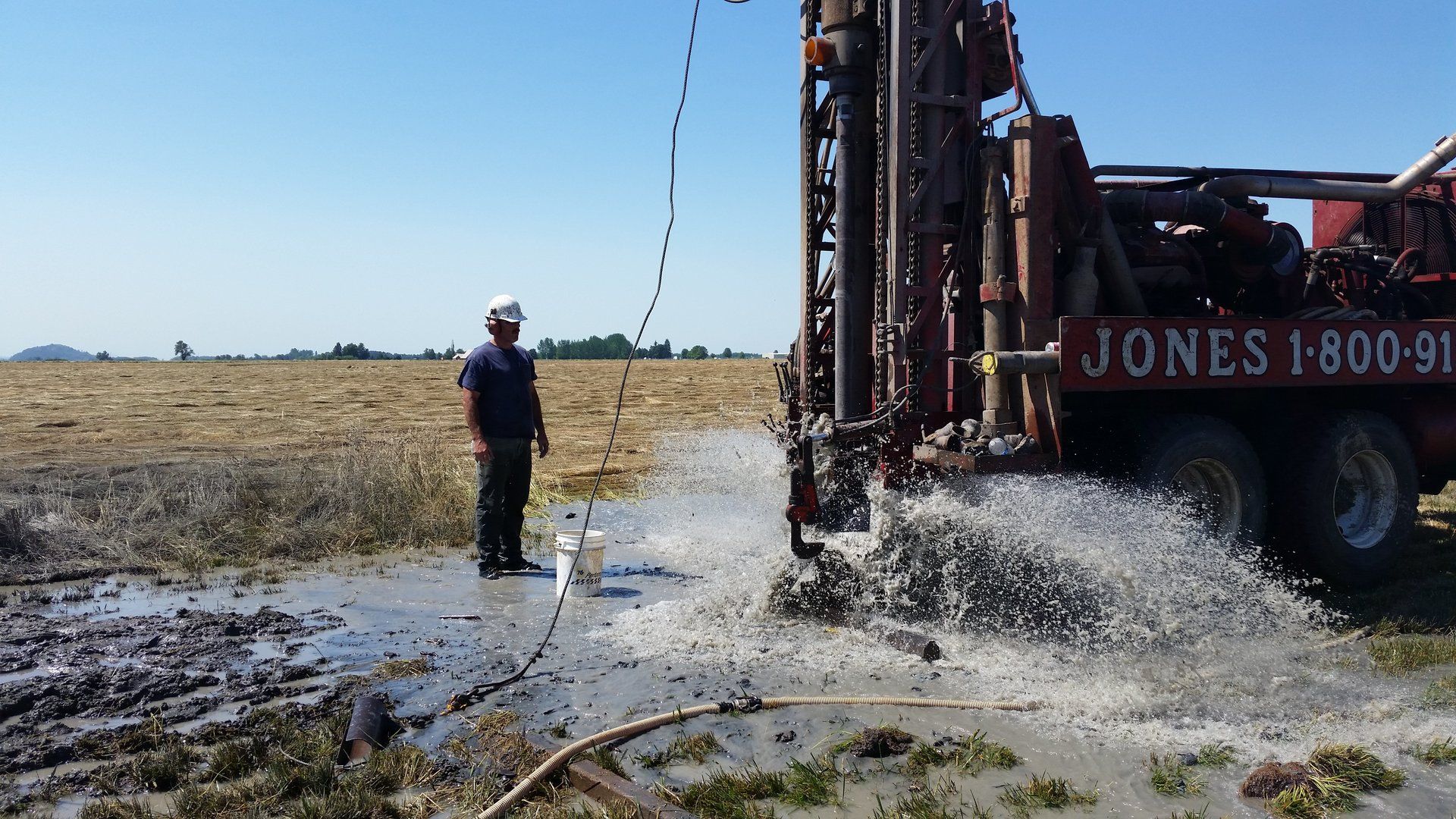 Man Working on the Installation Pump — Lebanon, OR — Jones Drilling & Pump Co