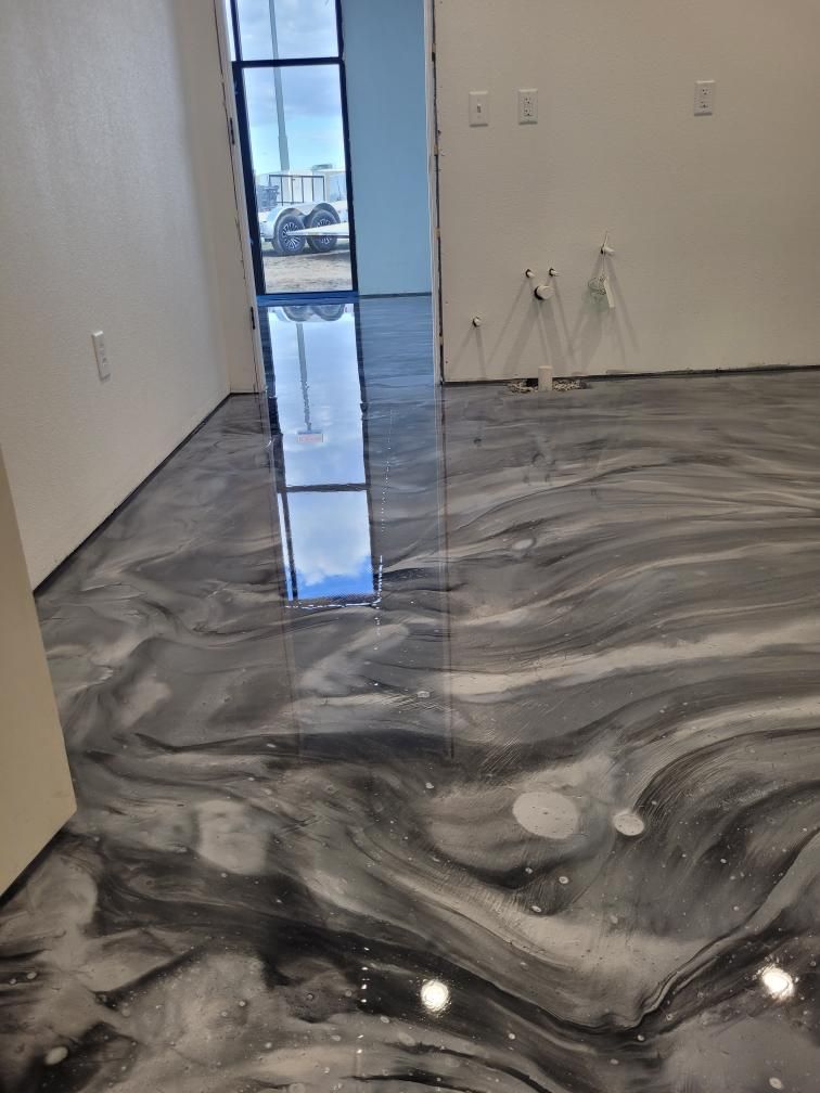 A room with a marble floor and a window.