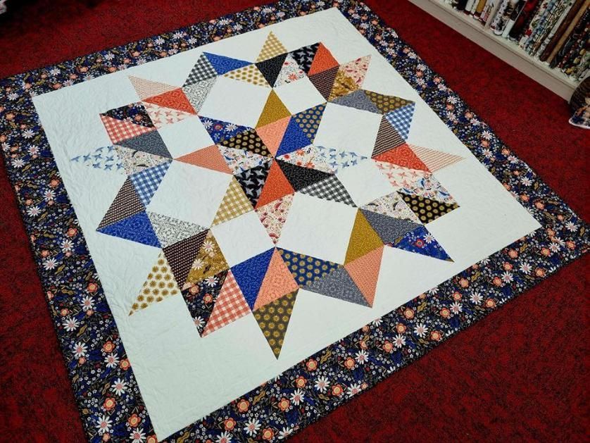 A Colourful Quilt With a Star Design on It — Stitch 2340 In Port Macquarie, NSW