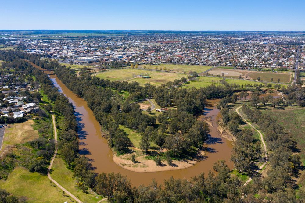 An Aerial View of a River Surrounded by Trees and a City — Stitch 2340 In Dubbo, NSW