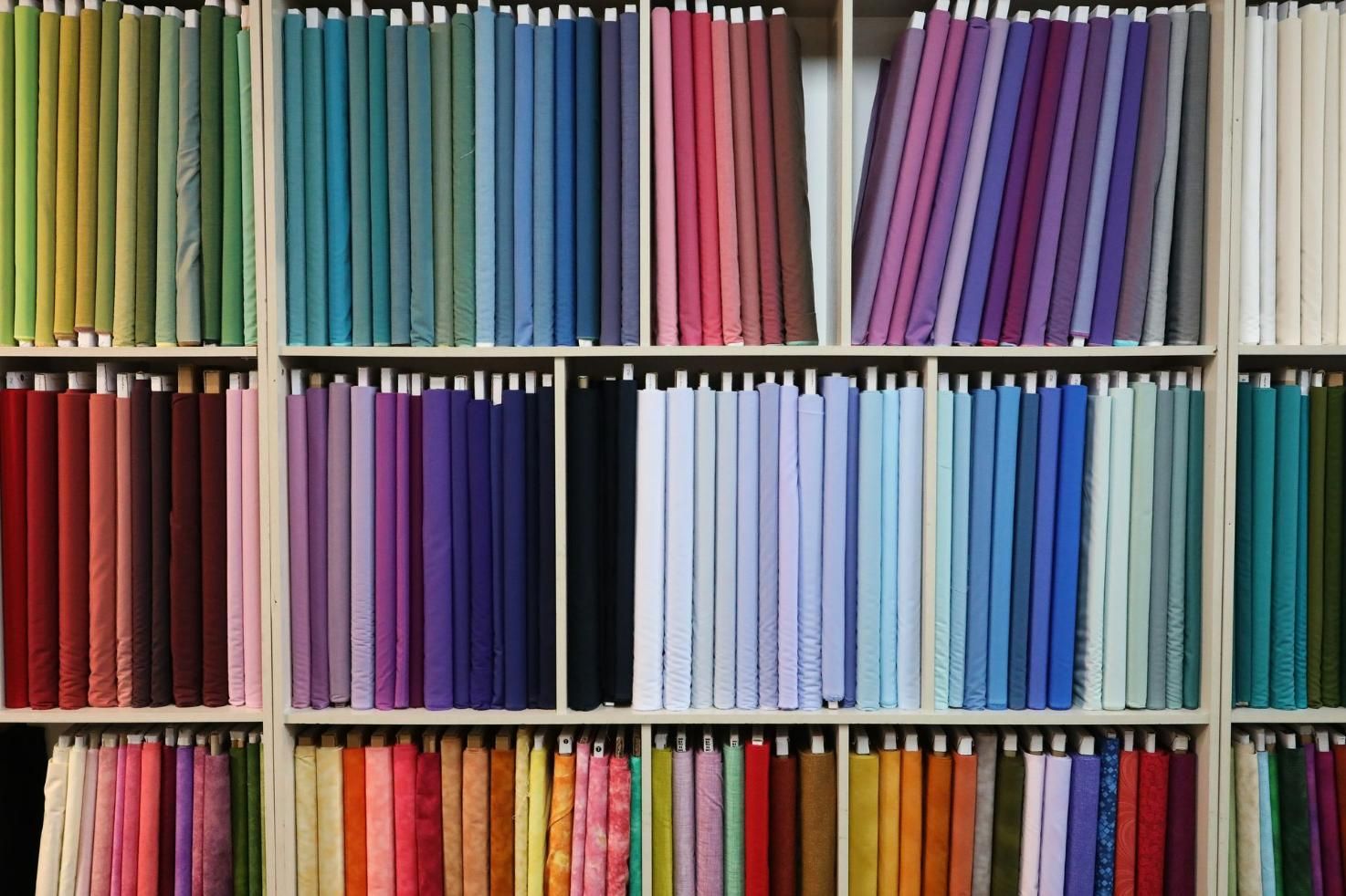 A Bookshelf Filled with Lots of Different Colored Pencils — Stitch 2340 In Tamworth, NSW
