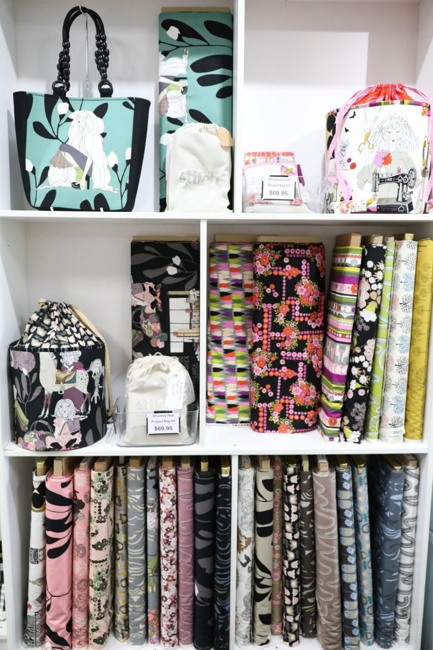 A Shelf Filled with A Variety of Fabrics and Bags — Stitch 2340 In Armidale, NSW