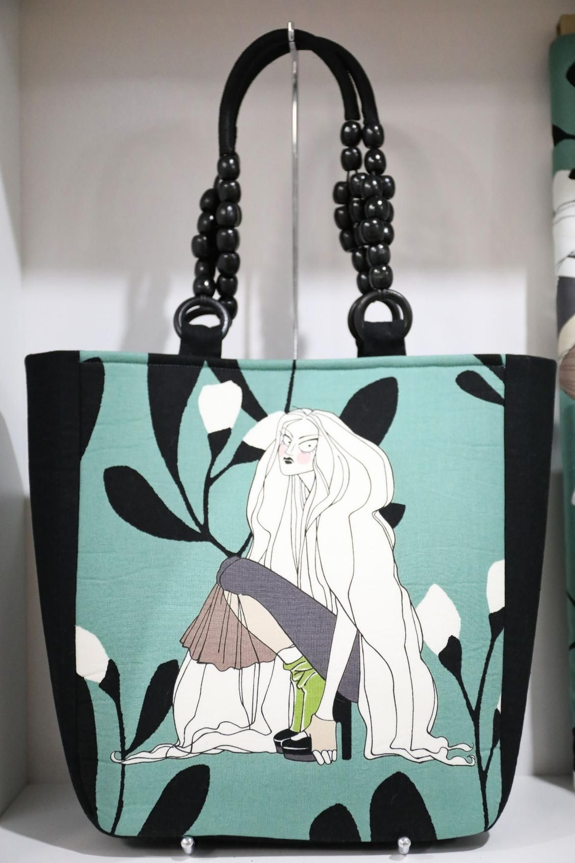 A Purse with A Picture of A Woman on It — Stitch 2340 In Inverell, NSW