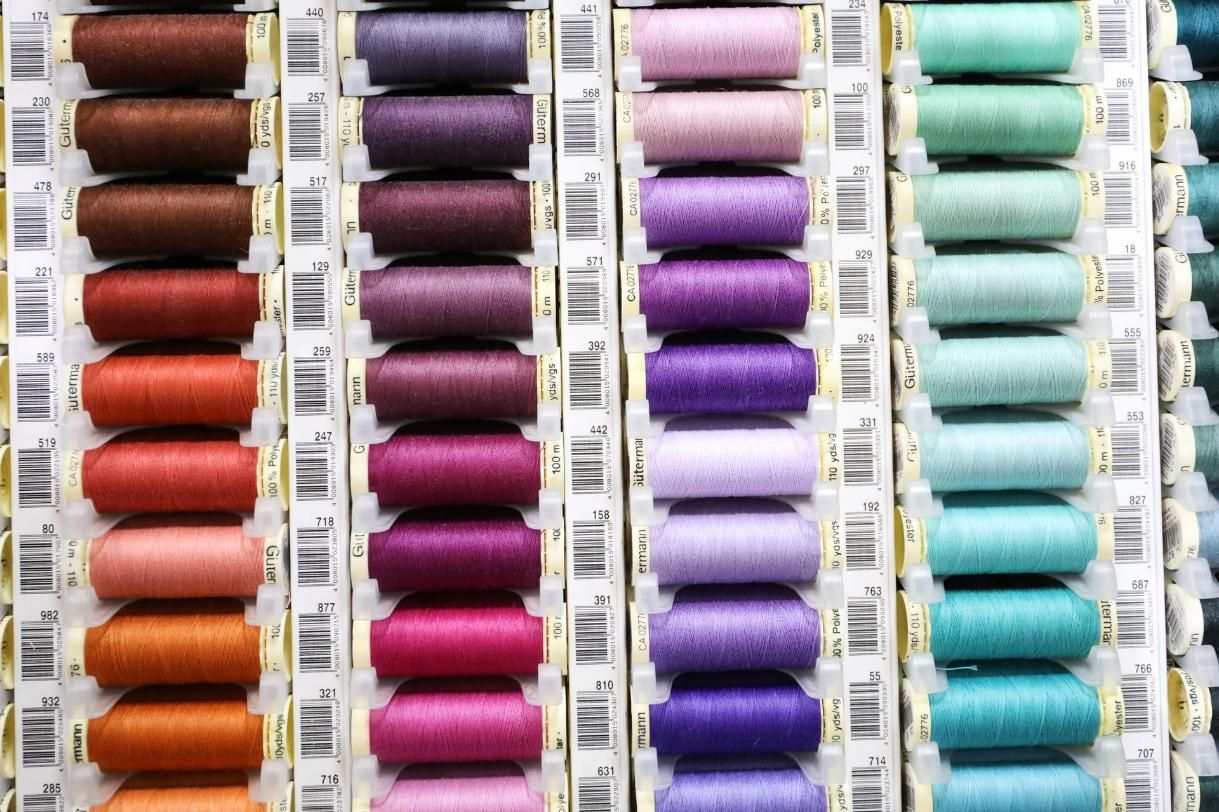 There Are Many Different Colored Spools of Thread on Display — Stitch 2340 In Tamworth, NSW