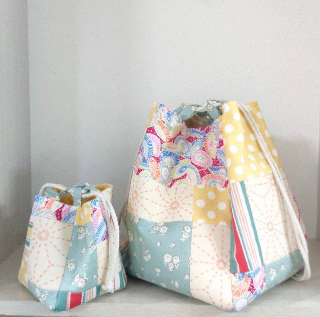 A Pillow with Flowers on It Is Sitting on A Chair — Stitch 2340 In Dubbo, NSW