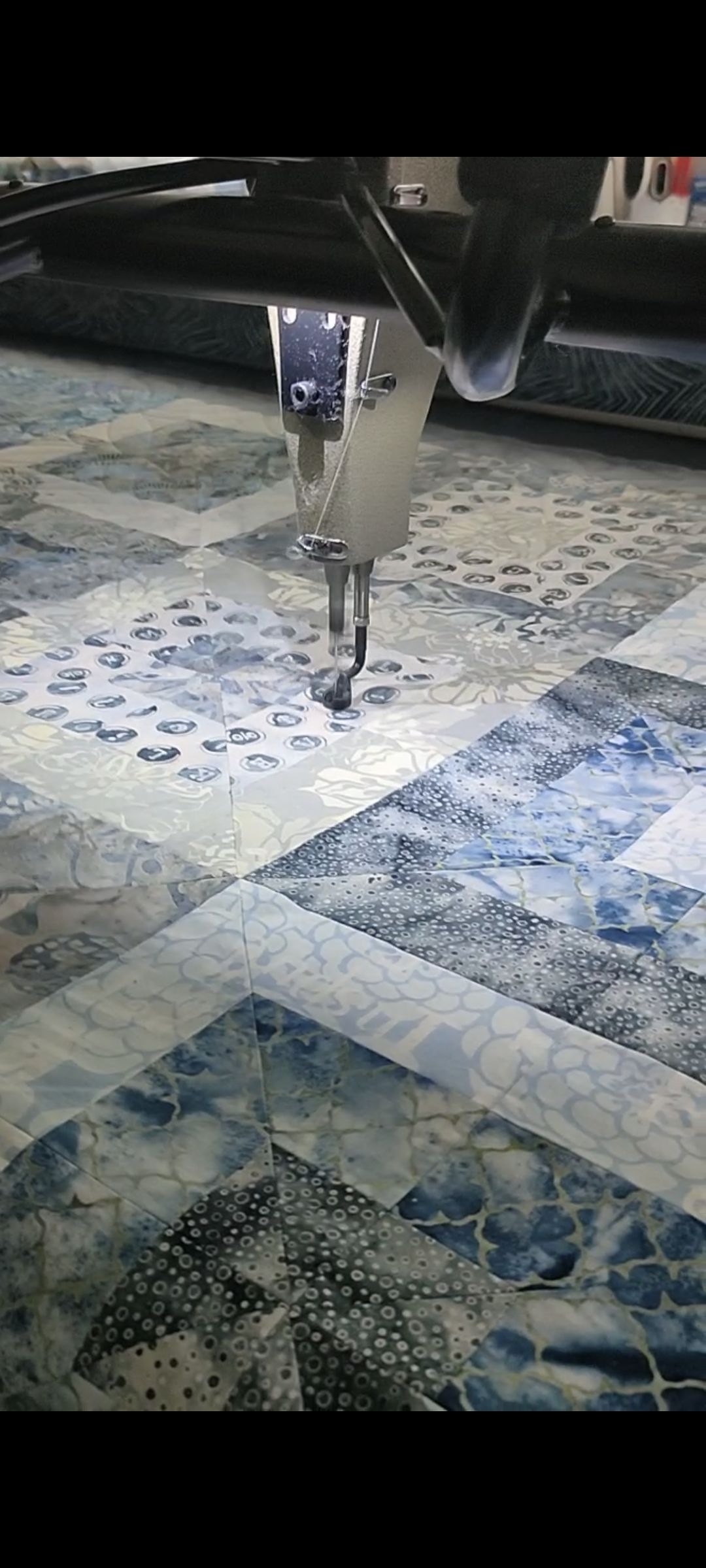 A Machine Is Cutting a Piece of Fabric on A Quilt — Stitch 2340 In Tamworth, NSW