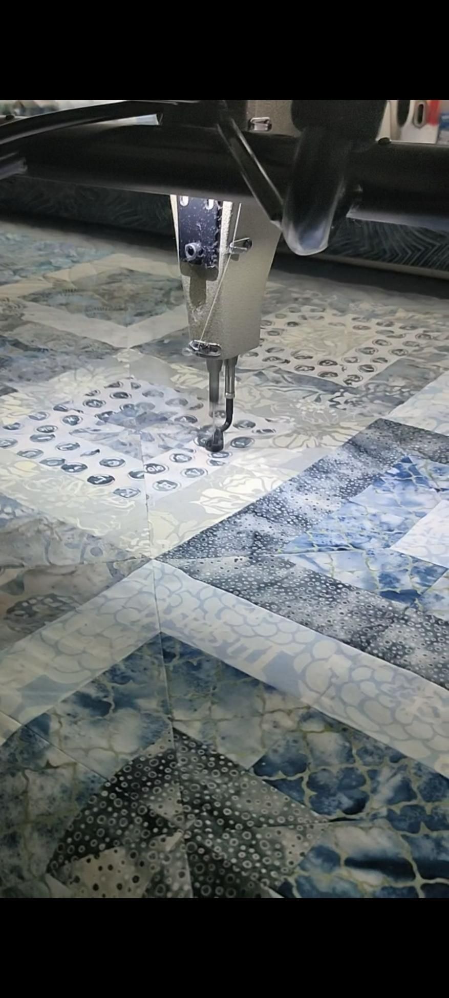 A Machine Is Stitching a Quilt on A Table — Stitch 2340 In Tamworth, NSW