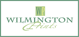 A green and white logo for wilmington prints