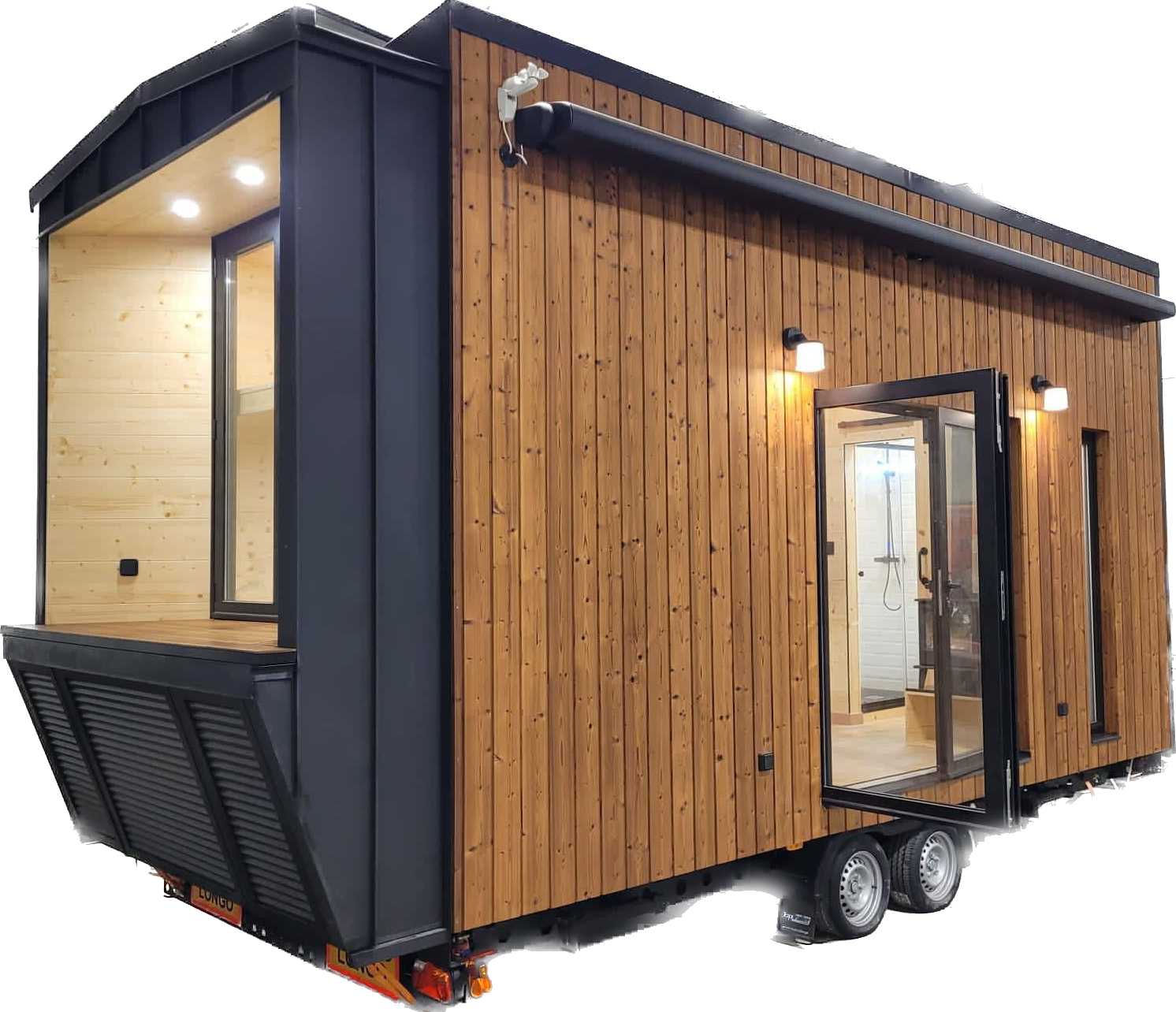 A modern, wood-paneled tiny home on wheels, with large windows and an open door.