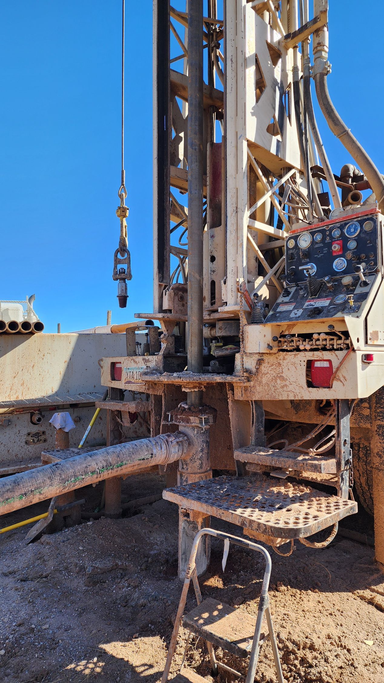 a large machine is drilling a hole in the ground .