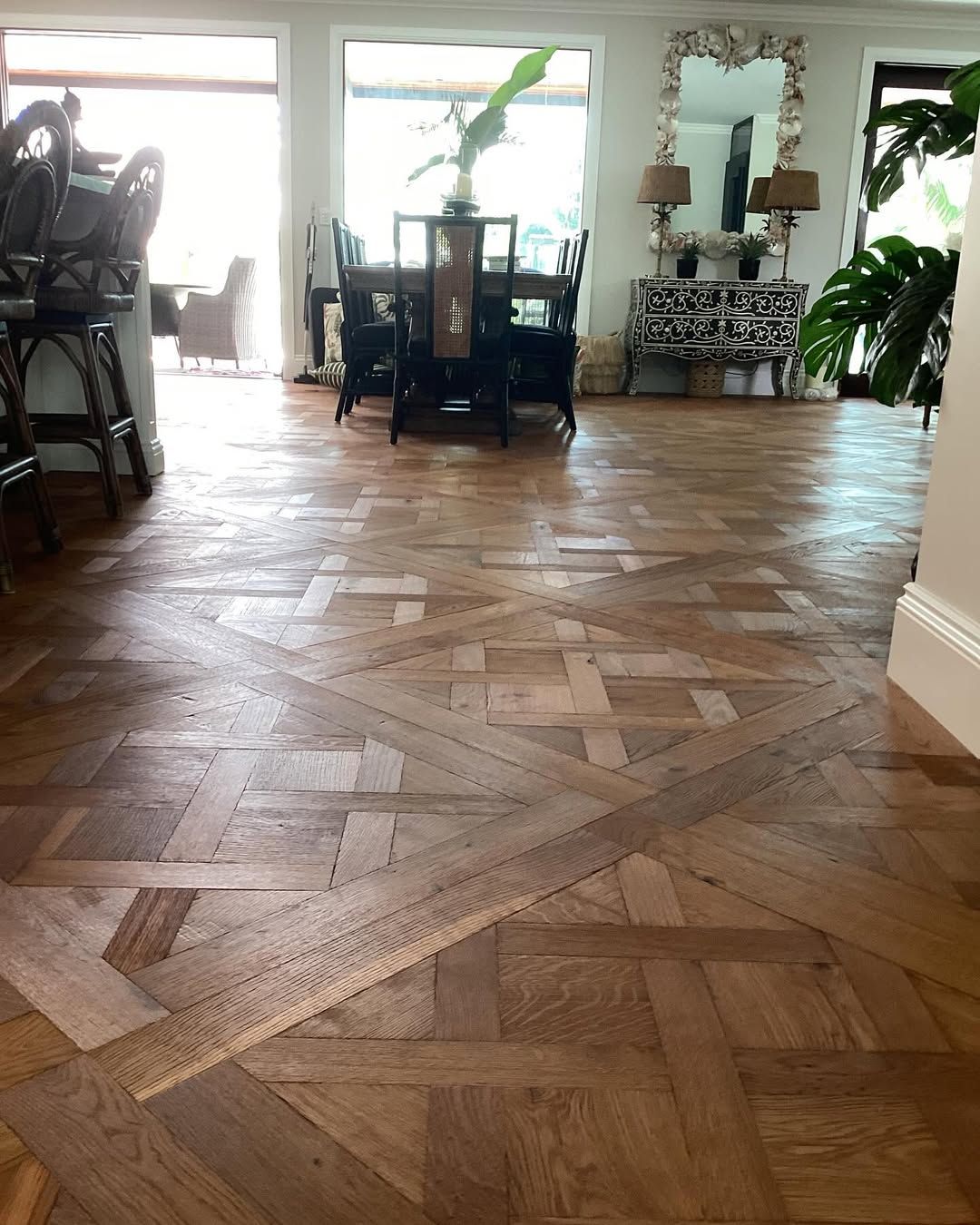 A Room With Brown Wooden Floor and Chairs — Timberfection Queensland in Yatala, QLD