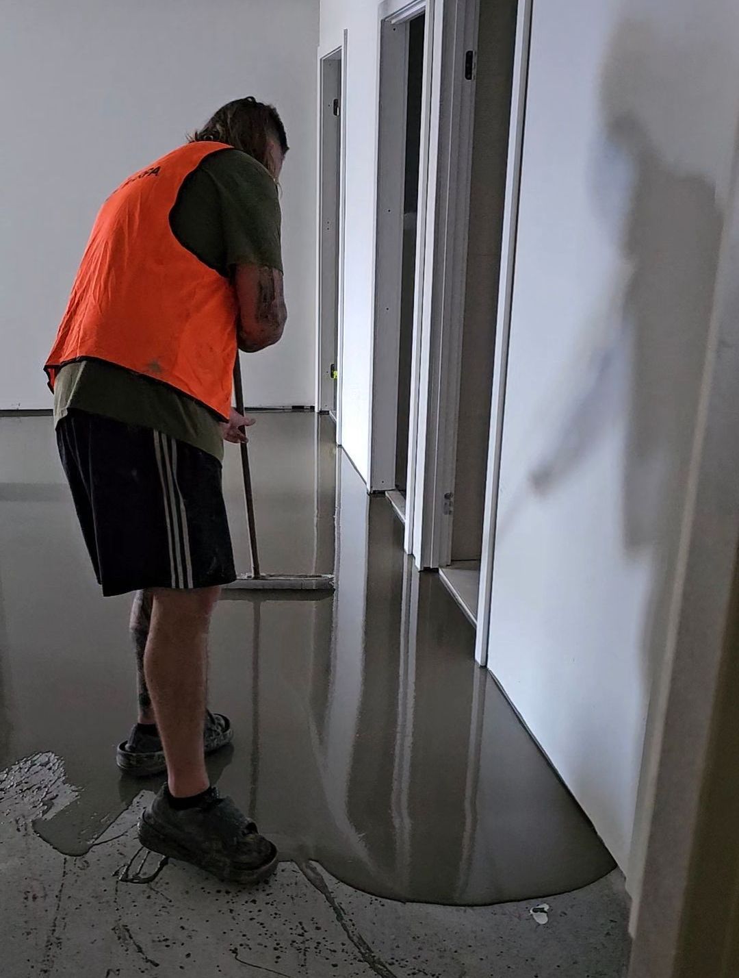 A Wooden Floor is Being Installed in a Room — Timberfection Queensland in Yatala, QLD