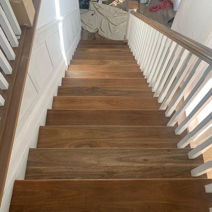 A Set of Wooden Stairs With a White Railing — Timberfection Queensland in Yatala, QLD