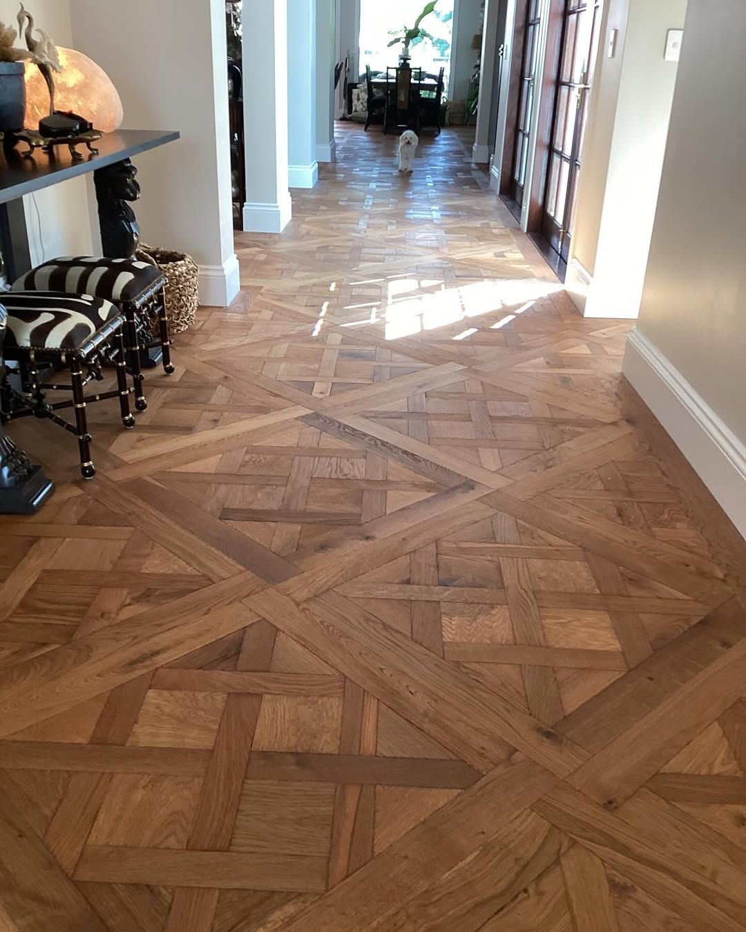 A Wooden Floor With a Geometric Pattern in a Hallway — Timberfection Queensland in Yatala, QLD