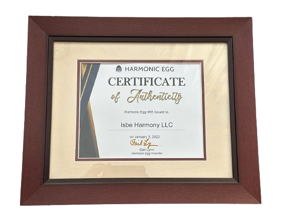 A certificate of authenticity is hanging on a wall