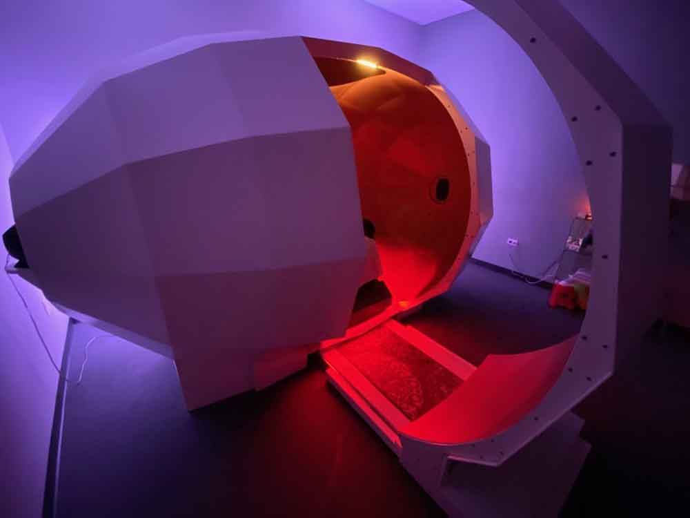 A room with a red light coming out of it.