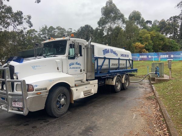 Filling a Tank — Water Delivery Services In Maleny, QLD