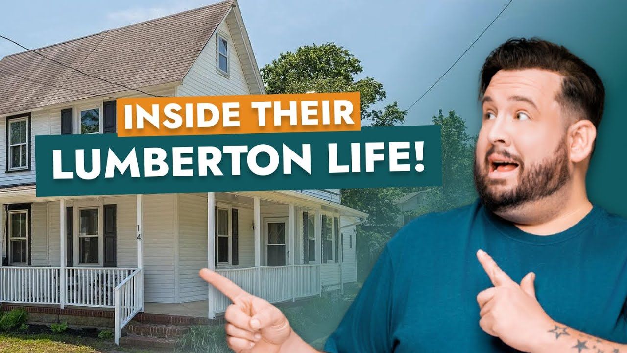 A man is pointing at a house with the words inside their lumberton life.