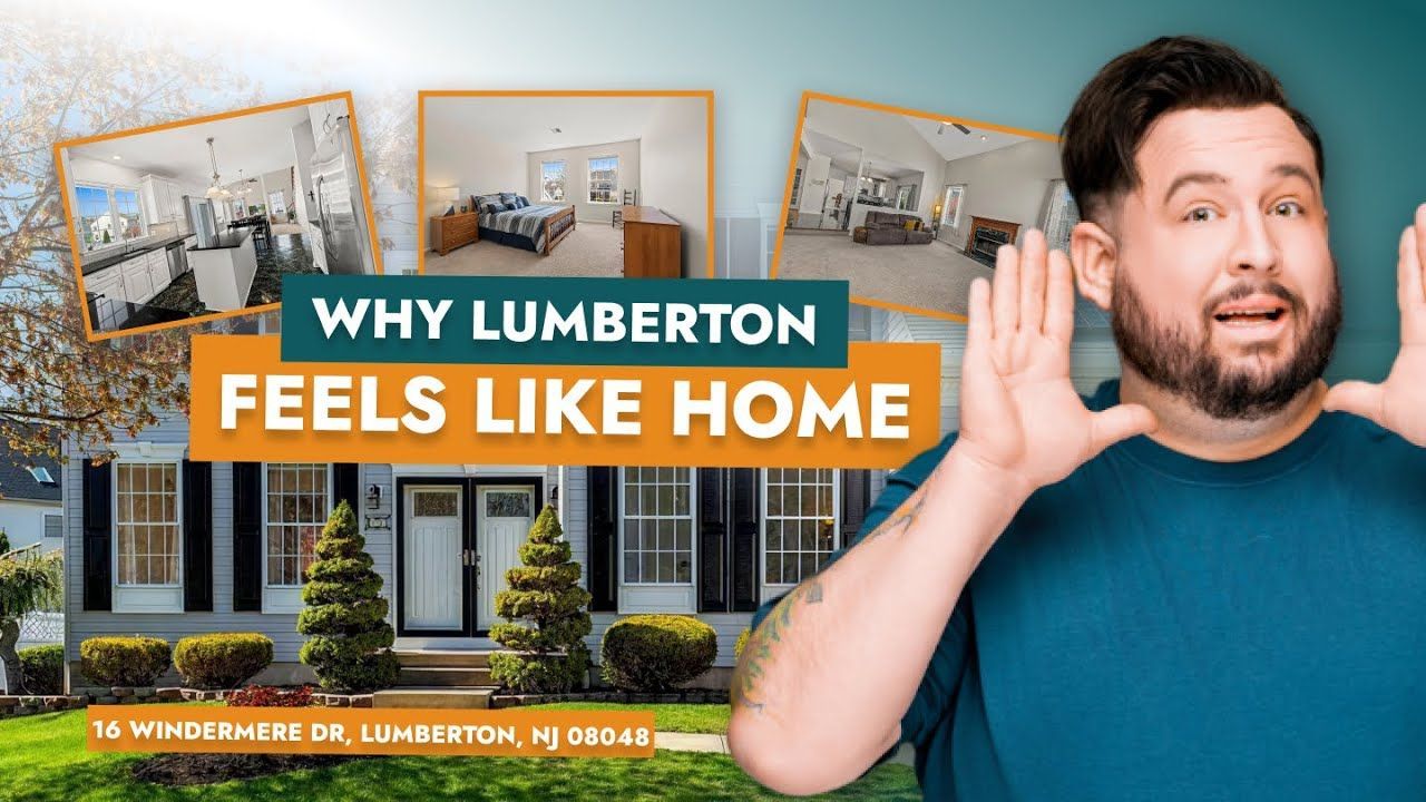 A man is standing in front of a house with a sign that says `` why lumberton feels like home ''.