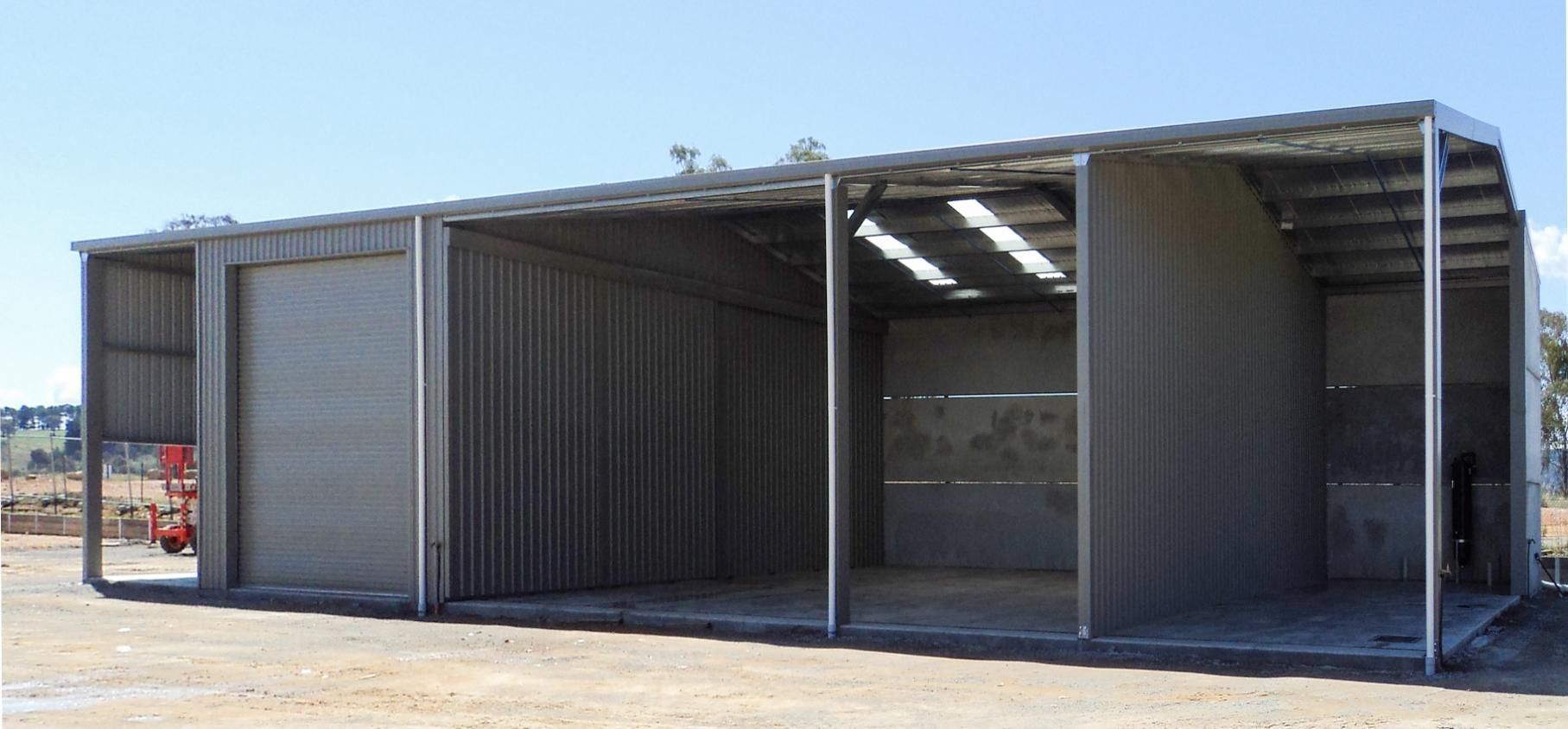 A Large Metal Building with A Blue Sky in The Background — Clearspan Builders In Queanbeyan East, NSW