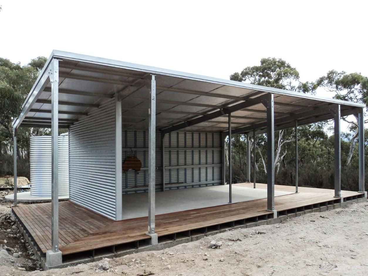 Shed with A Wooden Deck Underneath It — Clearspan Builders In Queanbeyan, NSW