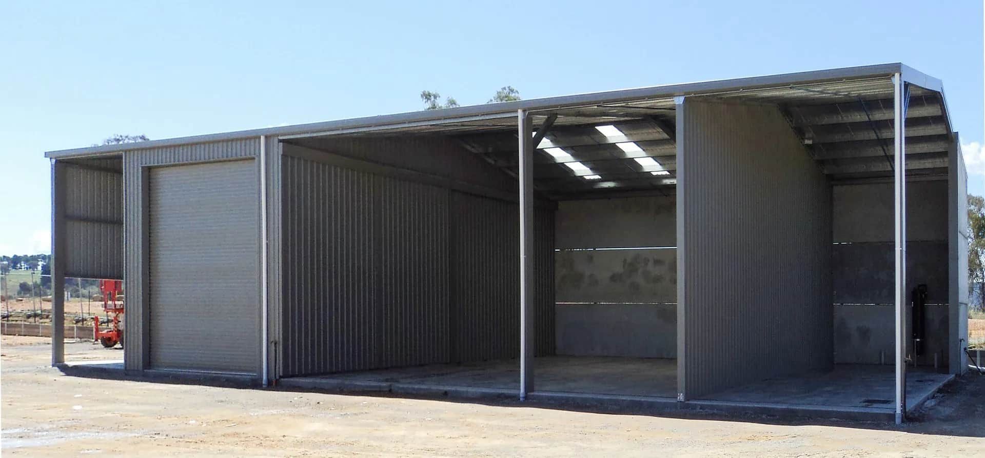 A Grey Shed In A Field— Clearspan Builders In Canberra, ACT