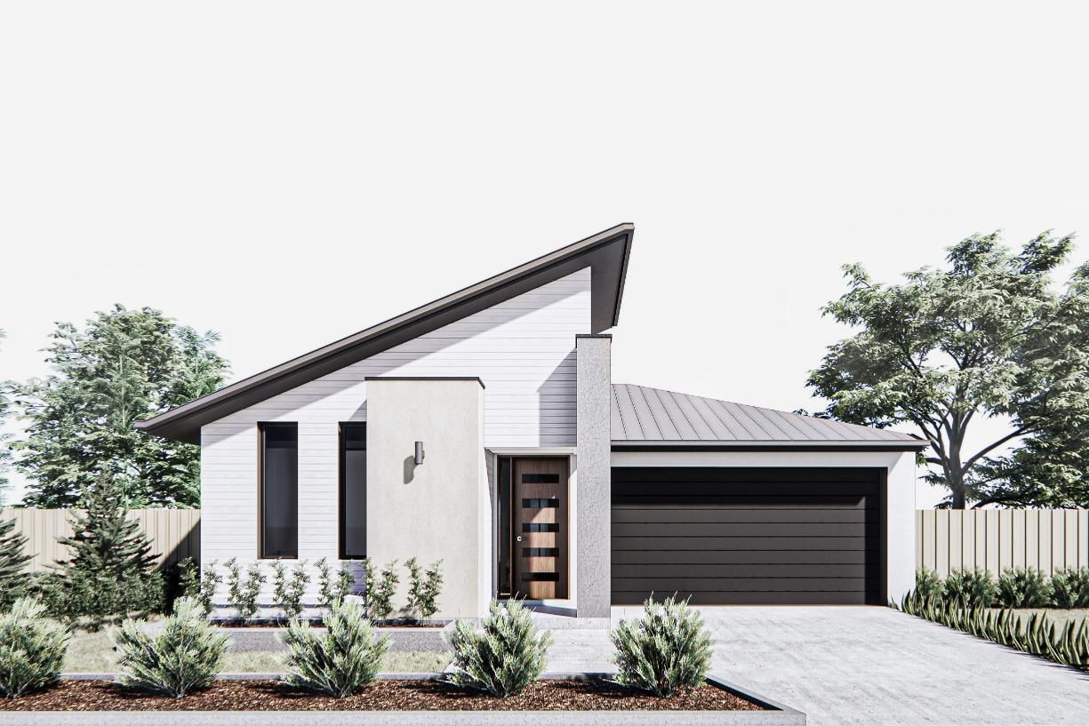 A White House with A Black Garage Door Is Surrounded by Trees and Bushes — Clearspan Builders In Queanbeyan East, NSW