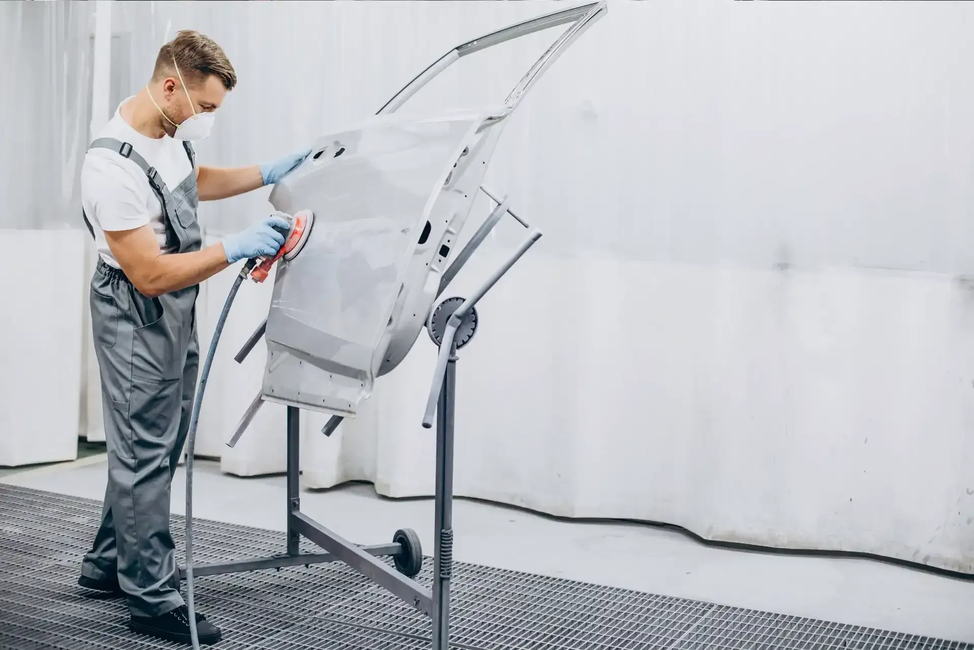auto body shop tech prepping door