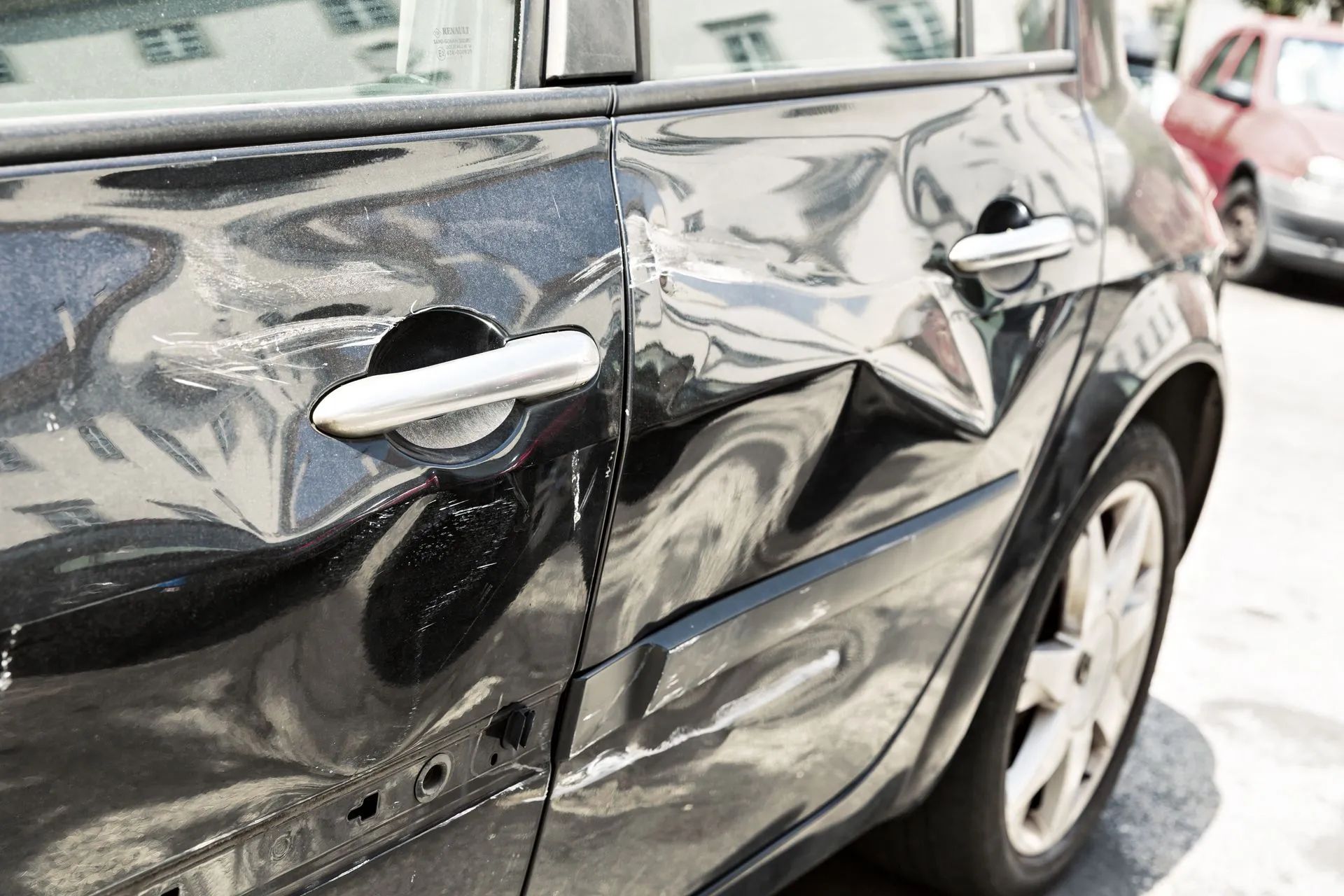 car door needing paintless dent removal