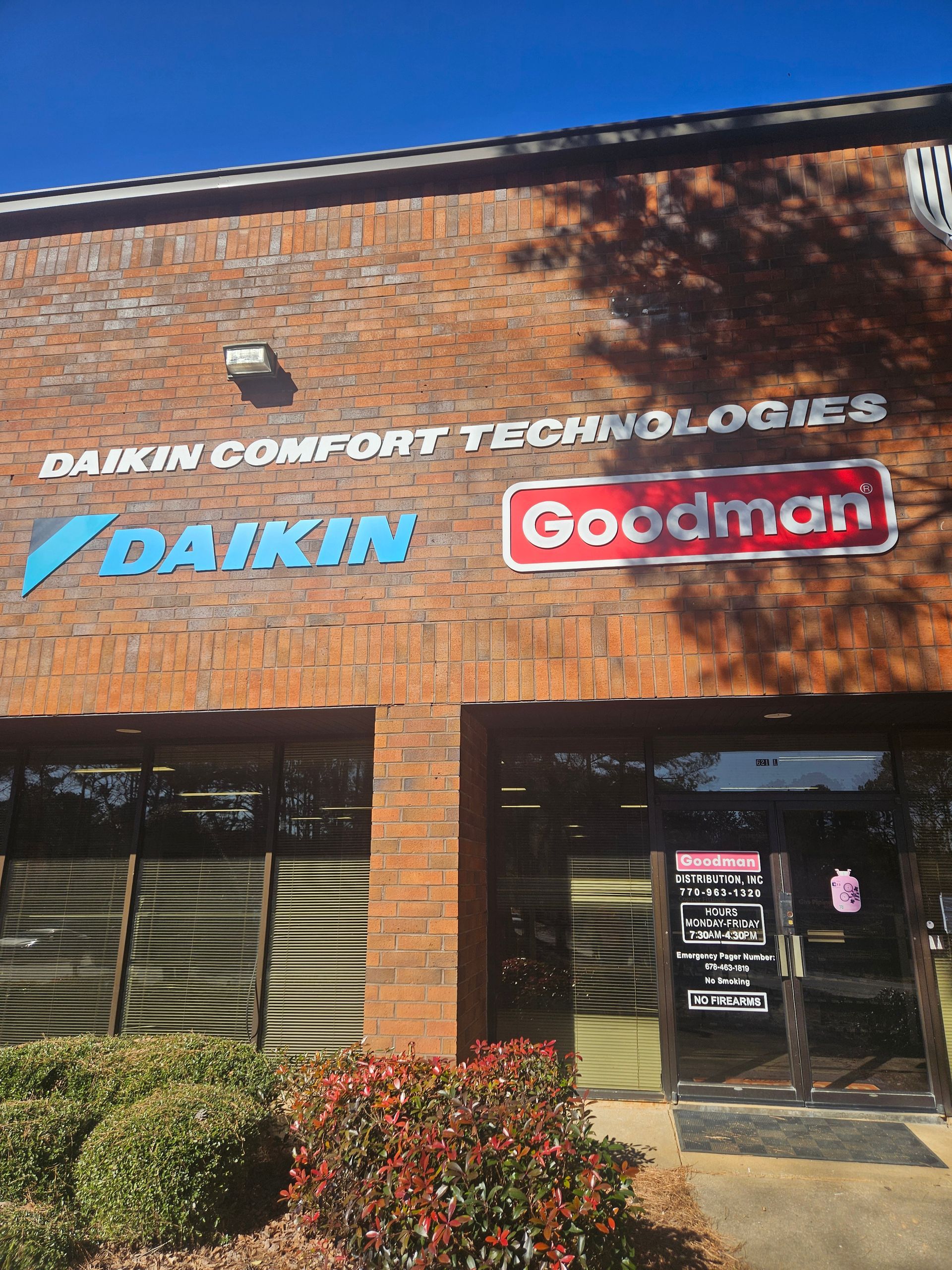 A brick building with a sign that says daikin comfort technologies