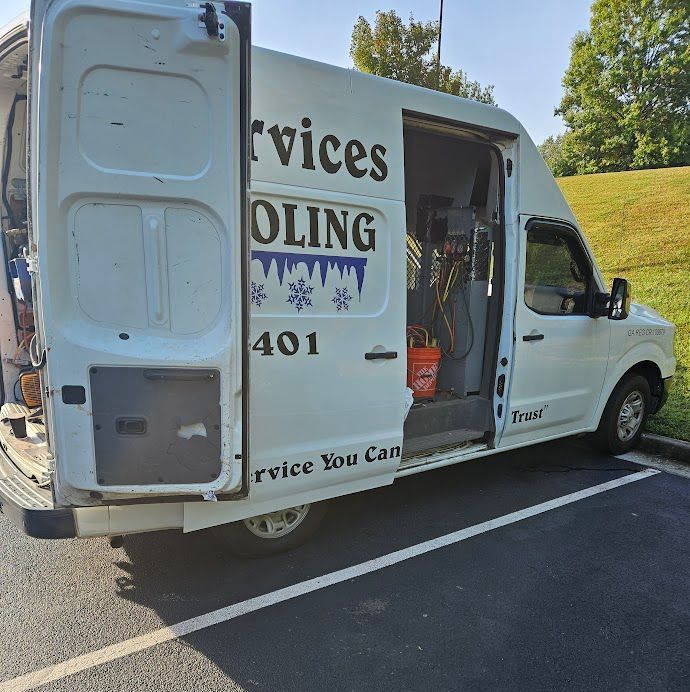 A white van with the word services on it