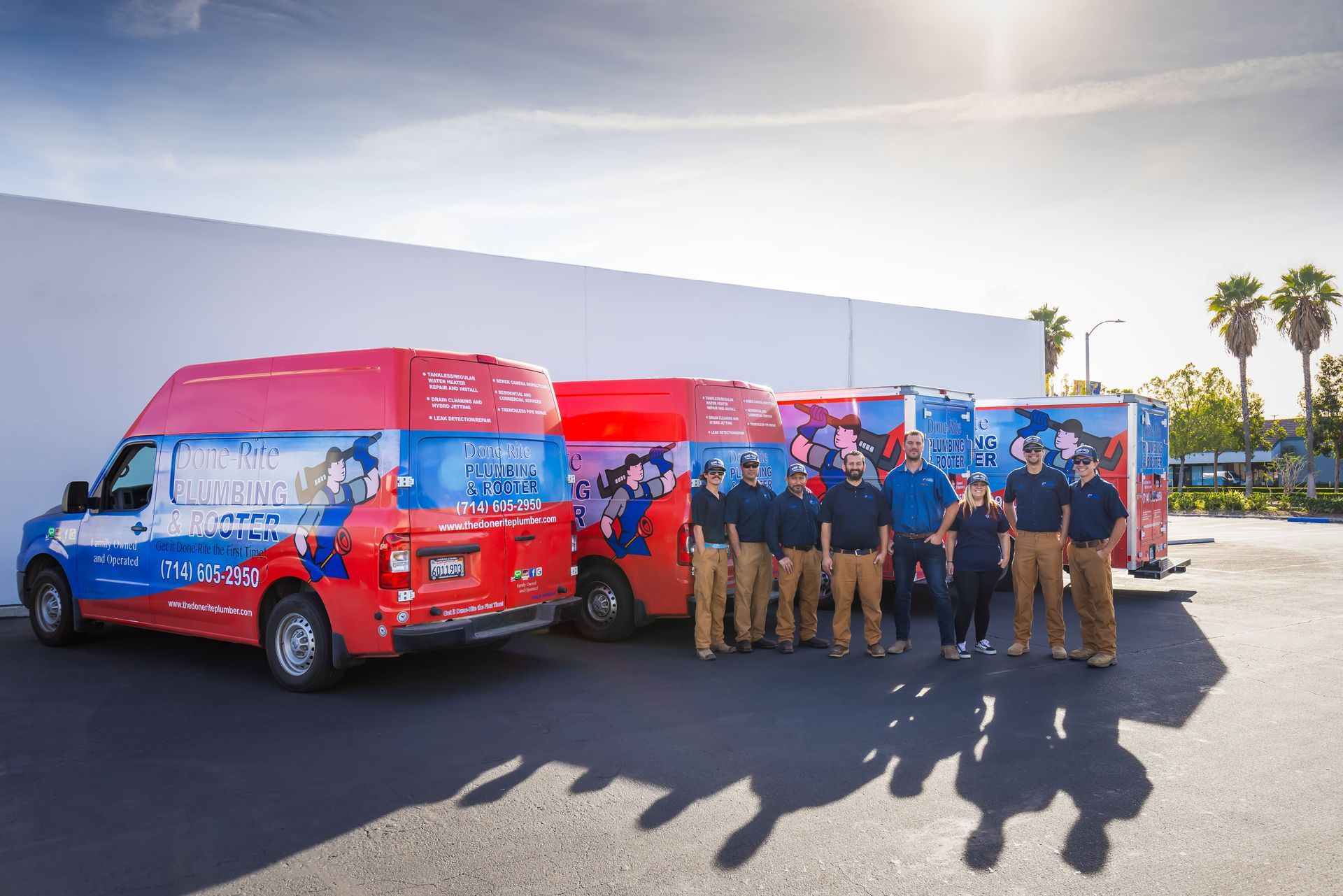 a done-rite plumbing and rooter truck is parked in a parking lot