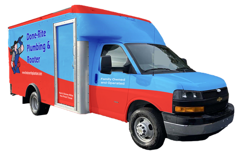 a blue and red van that says done-rite plumbing & rooter