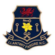 Coat of arms for Llantwit Fardre N.C. featuring a red dragon, keys, a daffodil, and the town's name.