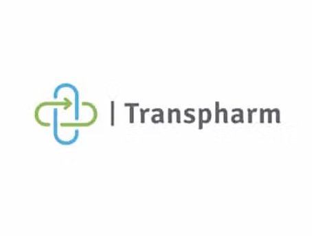 A logo for a company called transpharm with a green and blue arrow.