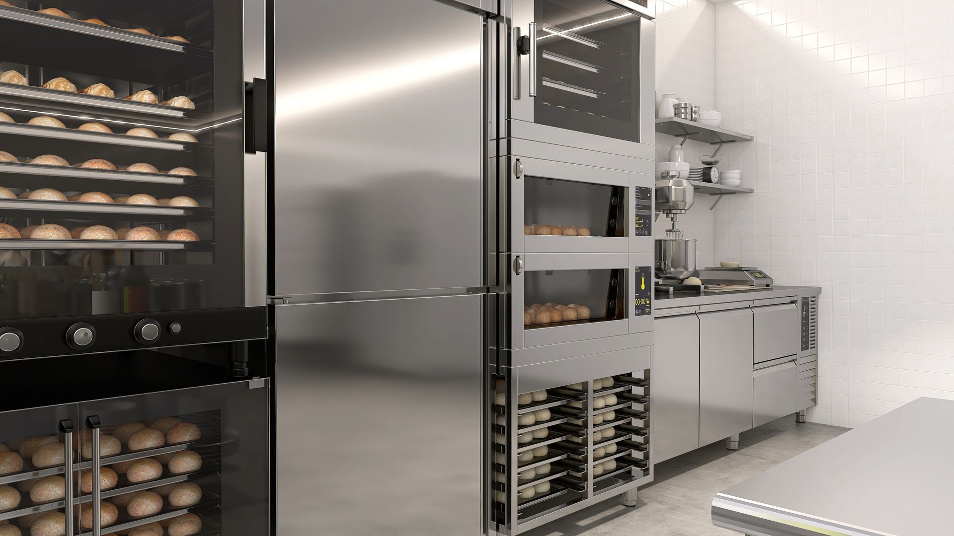 Commercial kitchen with stainless steel equipment and bread racks — Central Coast Commercial Kitchen Cleaning in Woy Woy, NSW