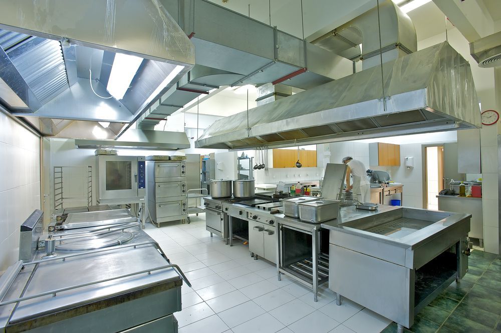 Commercial Kitchen With Stainless Steel Appliances — Central Coast Commercial Kitchen Cleaning in Tuggerah, NSW