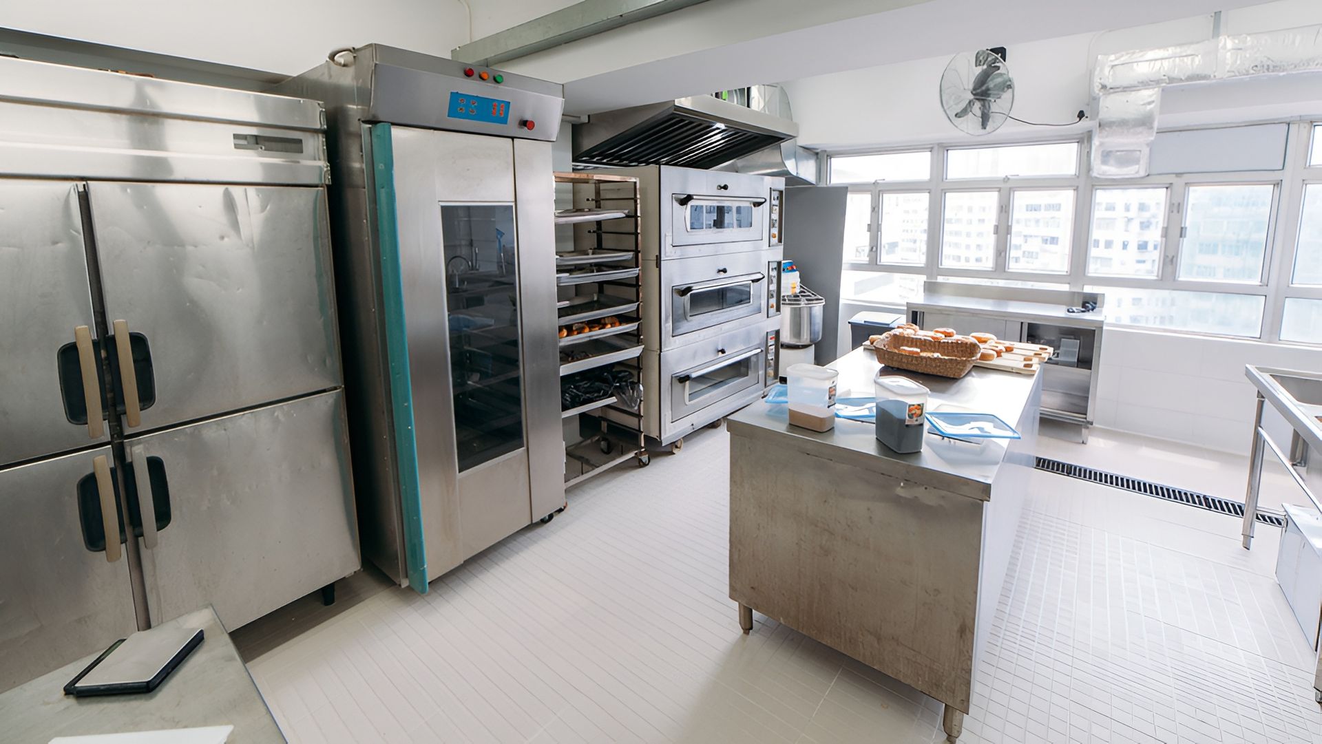 Commercial Kitchen With Stainless Steel Appliances — Central Coast Commercial Kitchen Cleaning in Swansea, NSW