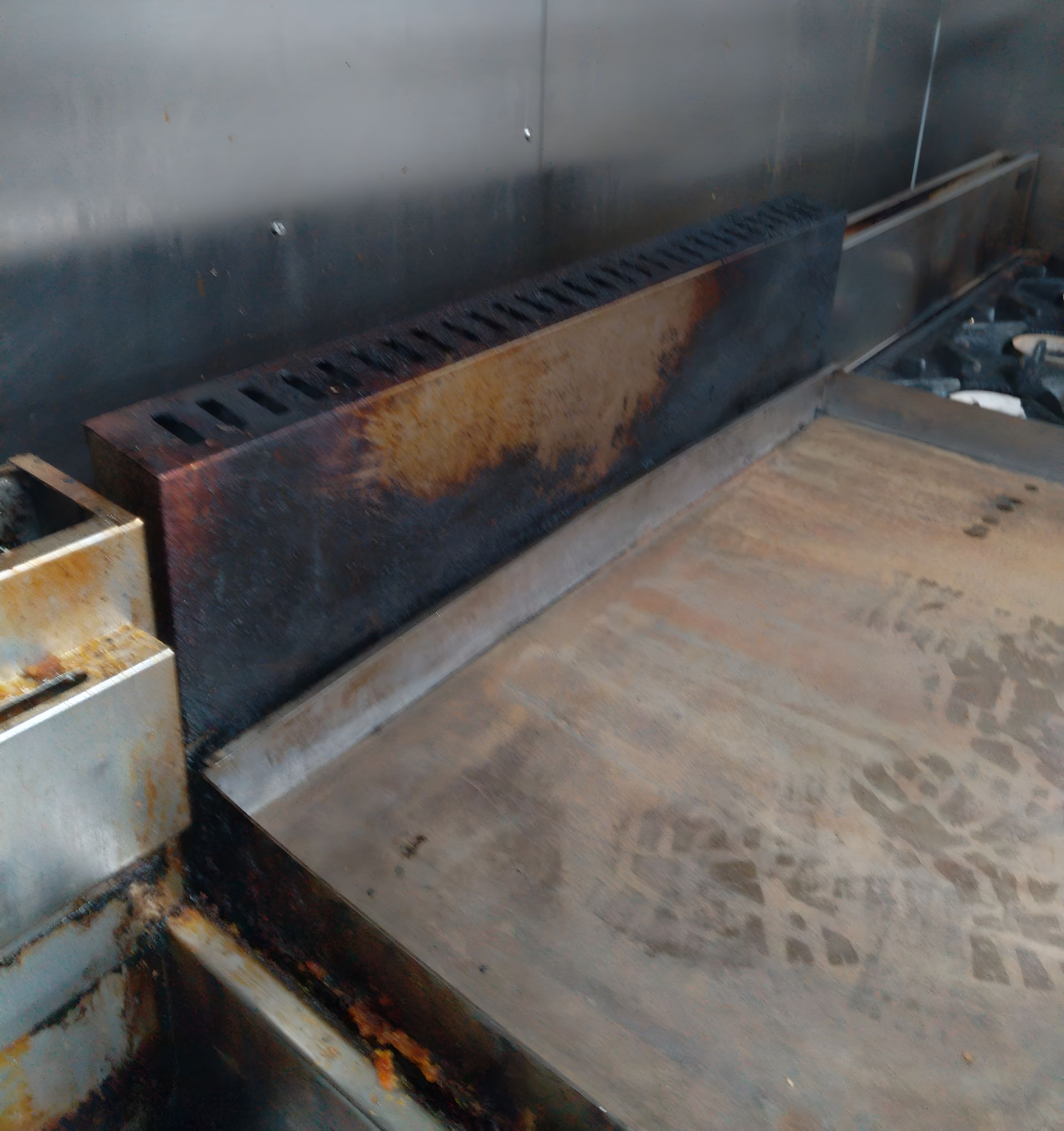 Griddle in Commercial Kitchen, Dirty With Grease — Central Coast Commercial Kitchen Cleaning in Hunter Valley, NSW