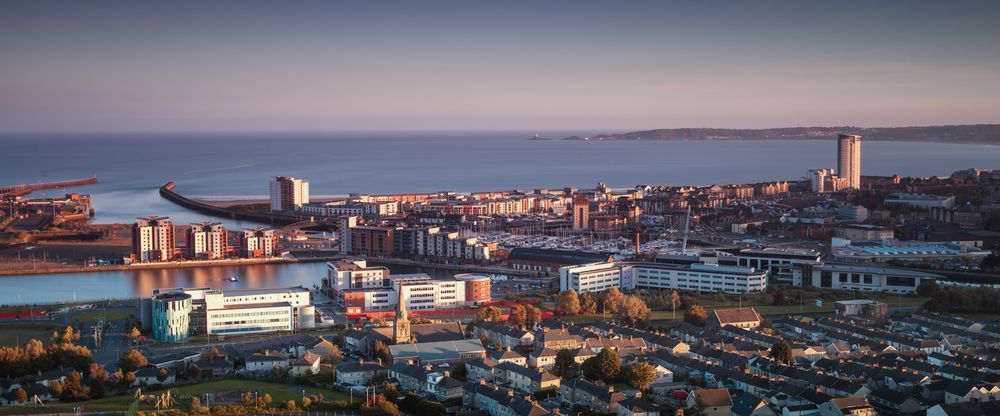 Aerial View of a Coastal City at Sunset — Central Coast Commercial Kitchen Cleaning in Swansea, NSW