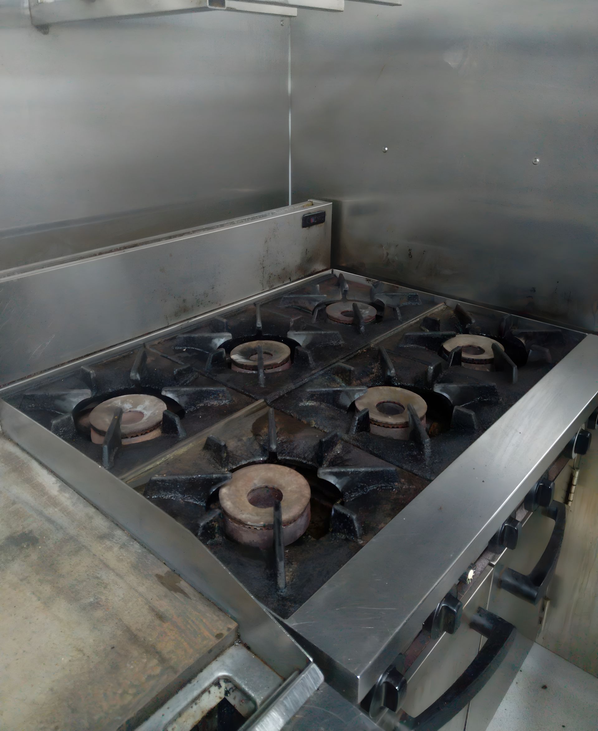 Six-burner Gas Stove in a Commercial Kitchen — Central Coast Commercial Kitchen Cleaning in Tuggerah, NSW