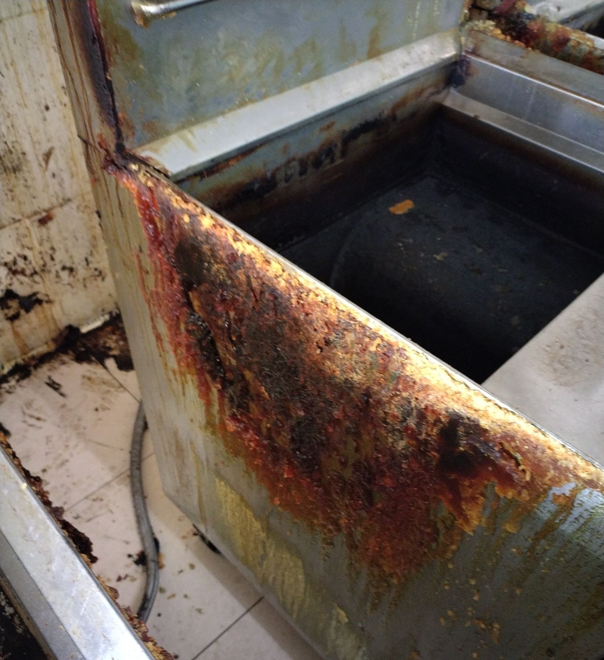 Close-up of a Severely Corroded Commercial Kitchen — Central Coast Commercial Kitchen Cleaning in Tuggerah, NSW