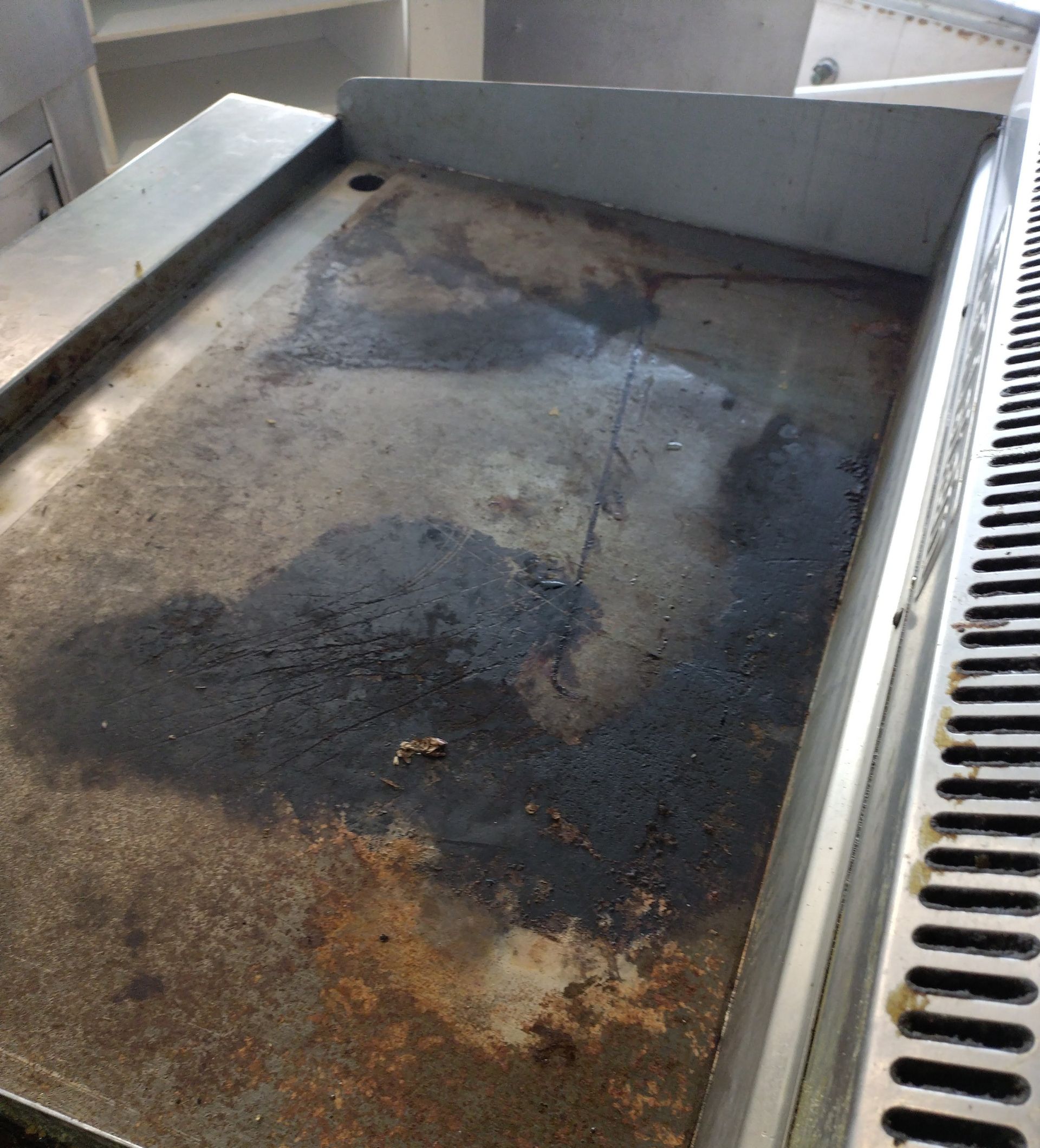 Griddle Surface, Stained With Grease — Central Coast Commercial Kitchen Cleaning in Tuggerah, NSW
